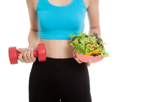 Asian healthy girl with dumbbell and salad — Stock Photo, Image