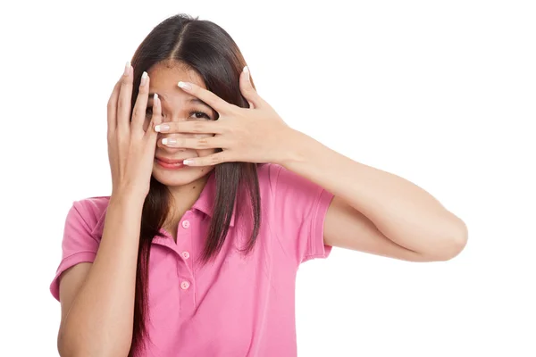 Beautiful Asian girl peeking through fingers — Stock Photo, Image