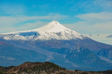 Volcan Villarrica viewed from Santuario El Cani, near Pucon, Chi clipart