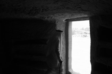 Saudian inside a Nabatean tomb in Madaîn Saleh archeological si