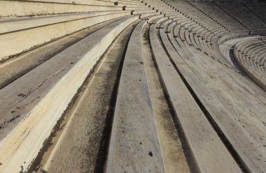 Satırları Olimpiyat Stadyumu, arka plan