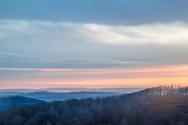 Sunrise over a mountain range — Stock Photo, Image