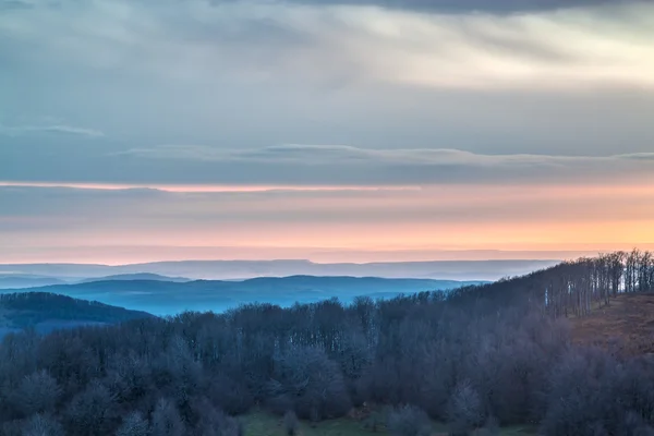 Sunrise over a mountain range — Stock Photo, Image