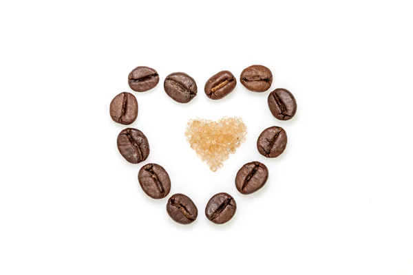 Coffee beans and sugar heart — Stock Photo, Image