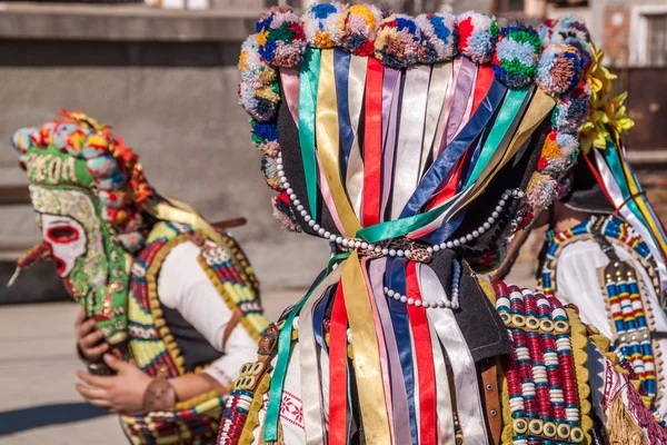 Colorful costumes and masks — Stock Photo, Image