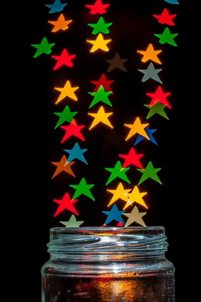 Bokeh colorido en forma de estrella —  Fotos de Stock