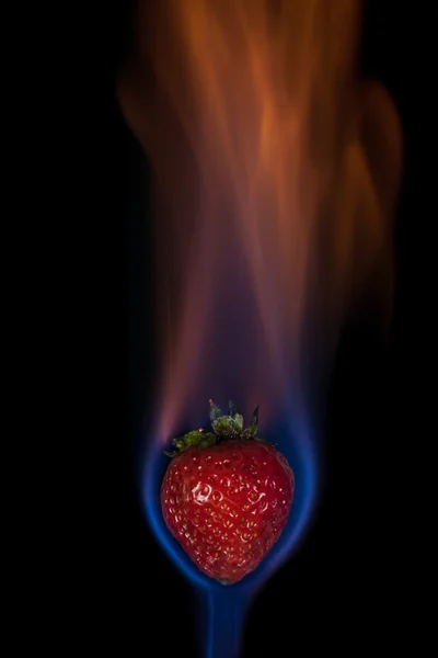 Strawberry on fire — Stock Photo, Image