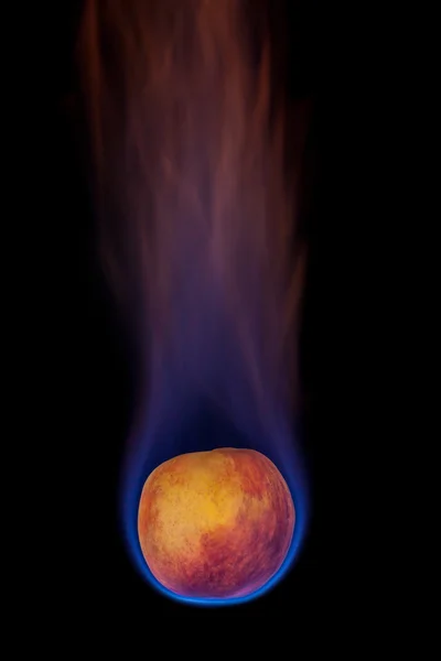 Peach on fire — Stock Photo, Image