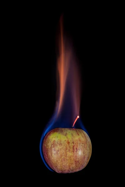 Apple on fire — Stock Photo, Image