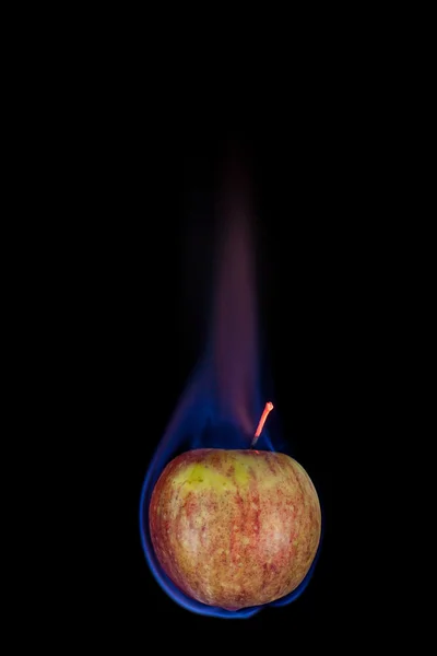 Apple on fire — Stock Photo, Image