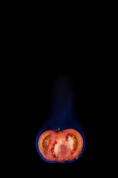 Tomato on fire — Stock Photo, Image