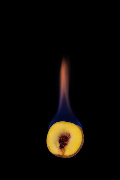 Peach on fire — Stock Photo, Image