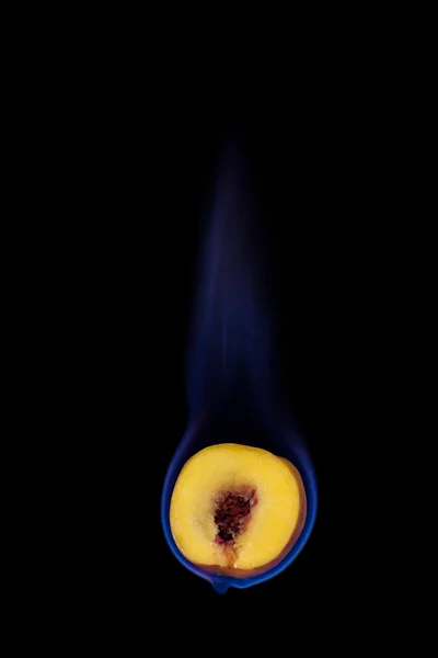 Peach on fire — Stock Photo, Image