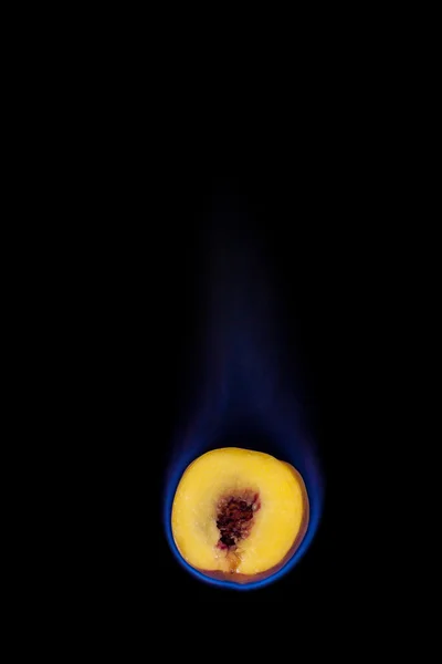 Peach on fire — Stock Photo, Image