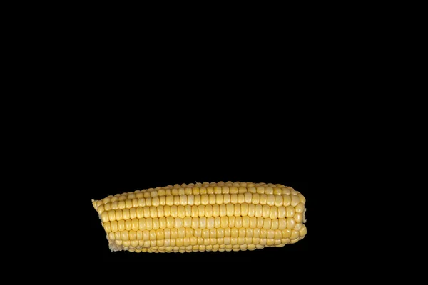 Mazorca de maíz en negro —  Fotos de Stock