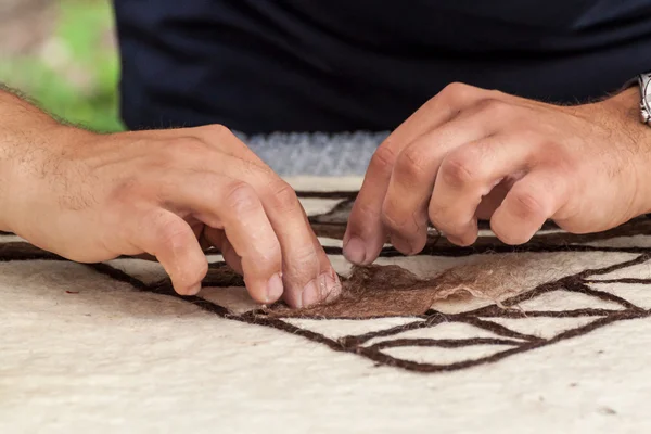 Old fashioned wool felting — Stock Photo, Image