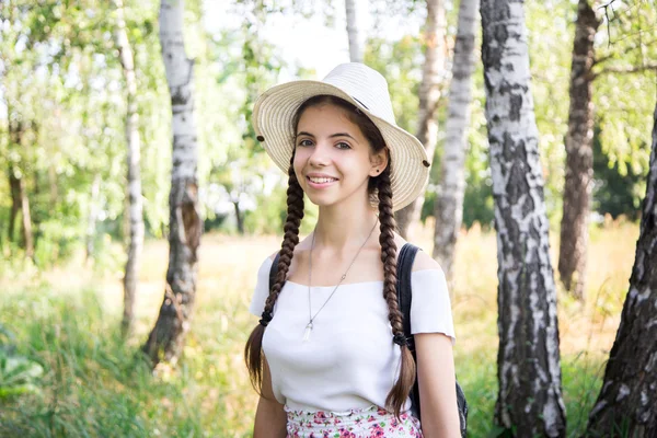 Young cheerful girl in birch forest — Stock Photo, Image