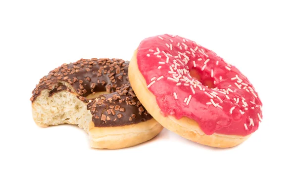 Dois donuts coloridos — Fotografia de Stock