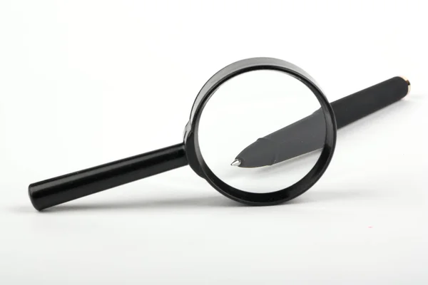 Pen magnifying glass — Stock Photo, Image