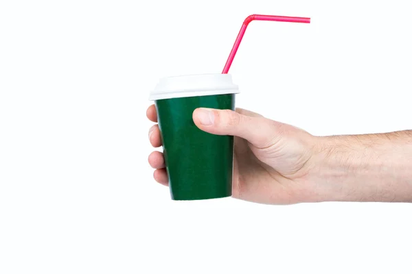 Tasse mit einem Strohhalm in der Hand — Stockfoto