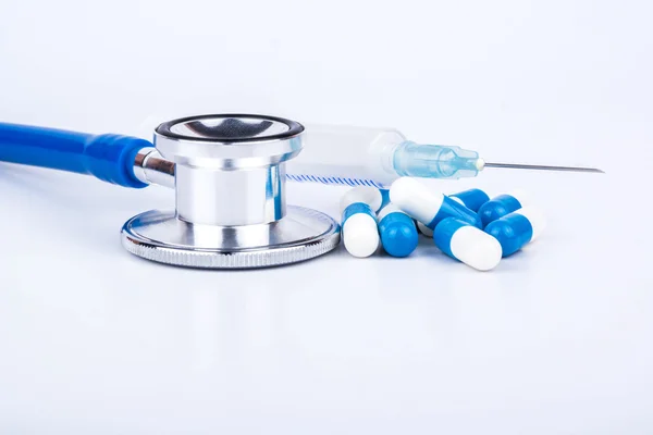 Stethoscope and capsule — Stock Photo, Image