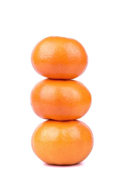 Три мандарина — стоковое фото