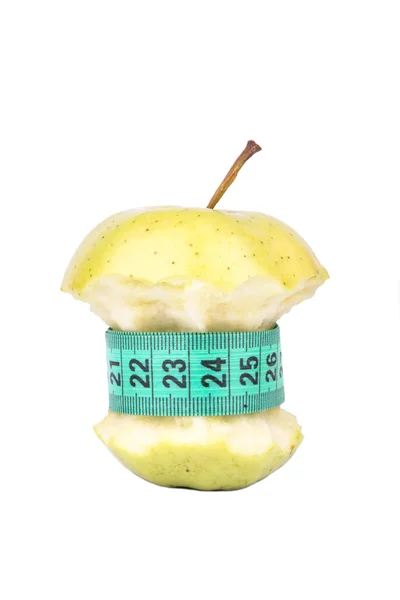 Apple core and meter — Stock Photo, Image