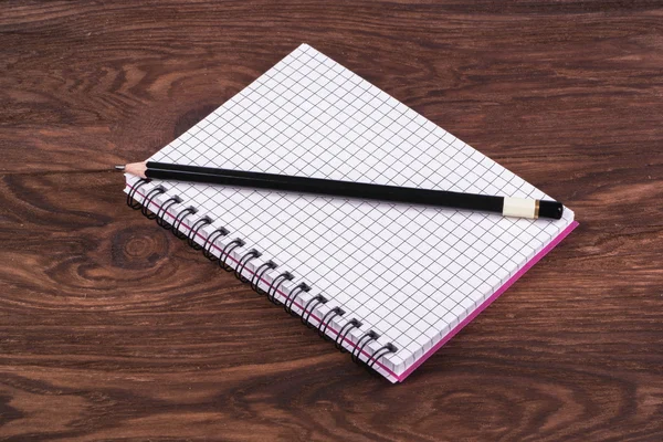 Open notebook and pencil — Stock Photo, Image