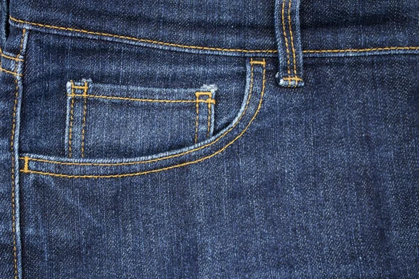 Mode aus der Tasche der Blue Denim Jeans lizenzfreie Stockfotos