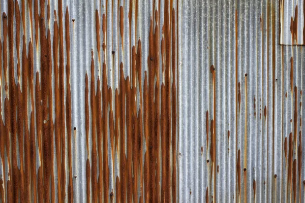 Textura de fundo de ferro galvanizado antigo com ferrugem vermelha Imagem De Stock