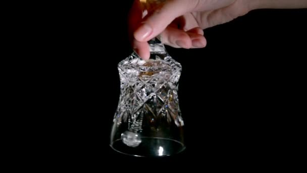 Crystal hand bell op een zwarte achtergrond — Stockvideo