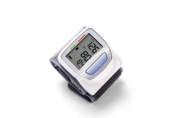 Dispositivo de medição de pressão arterial em cima de um pulso — Fotografia de Stock