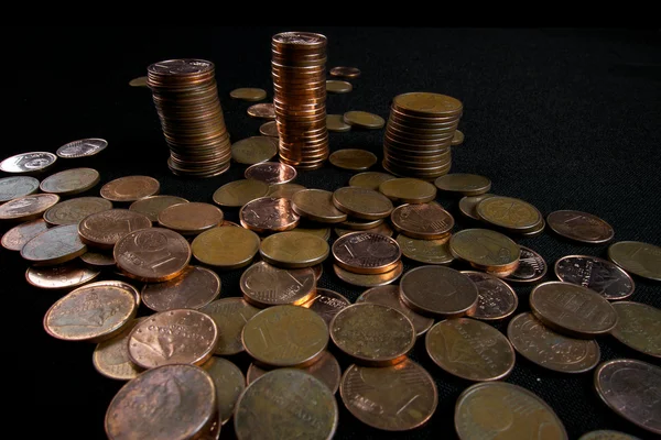 Business and money saving concept - close up of euro cents and column of money — Stock Photo, Image