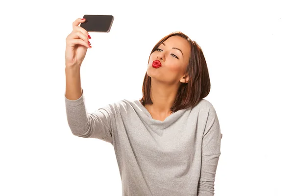 Beautiful young woman taking selfie. — Stock Photo, Image