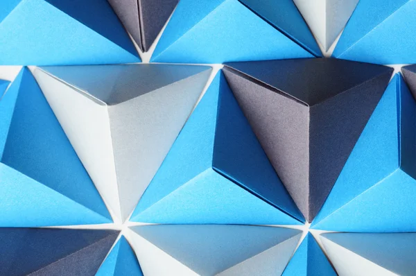 Tetraedros de origami en colores azul y gris . — Foto de Stock