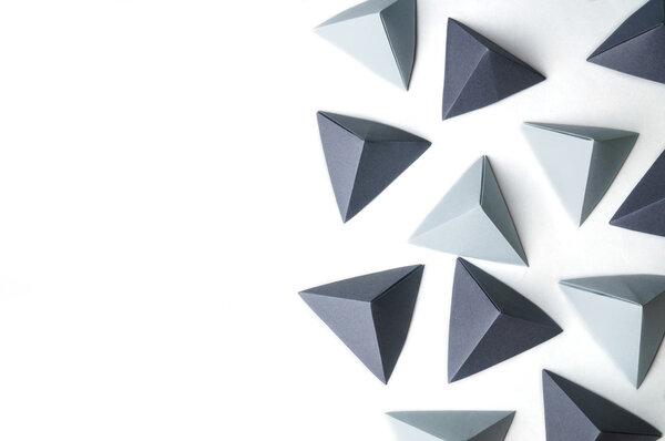 Origami pyramids abstract background