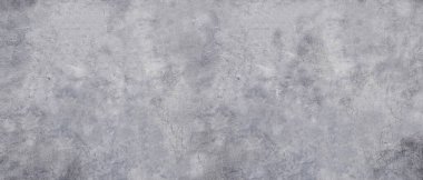 Gri beton dokusu ve sıkıntılı dokusu var.