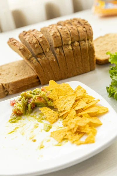 Table Mold Sliced Whole Wheat Bread Next Lettuce Plate Nachos — Stock Photo, Image