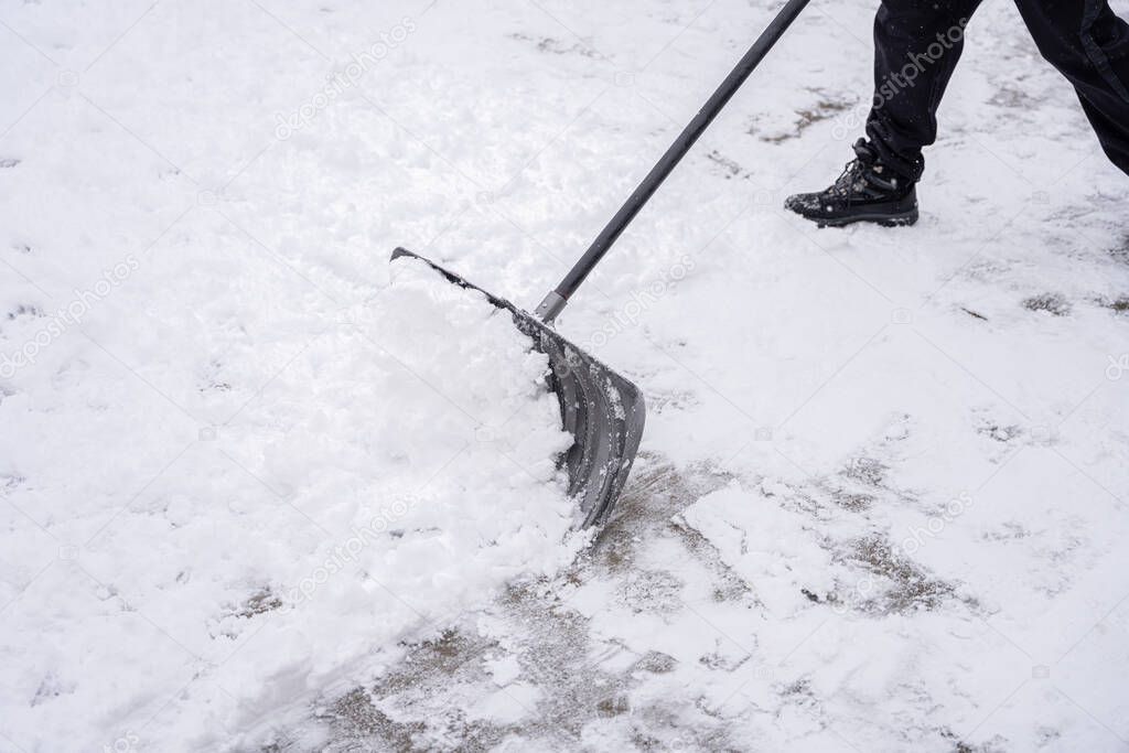 snow shovel pushes the snow and ice from your path after a snow storm