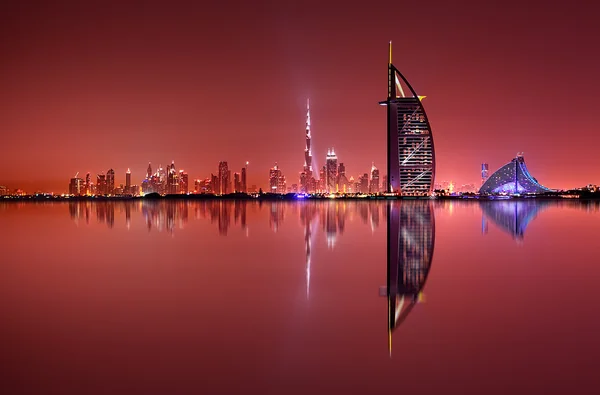 Dubai skyline reflection at amazing night, Dubai, United Arab Emirates — Stock Photo, Image