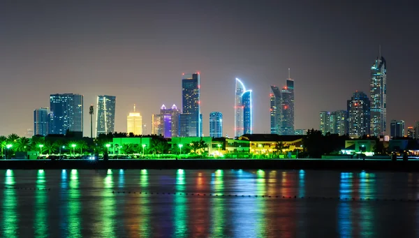 Amazing night dubai downtown skyline with tallest skyscrapers and beautiful Jumeirah beach reflection, Dubai, United Arab Emirates — Stock Photo, Image