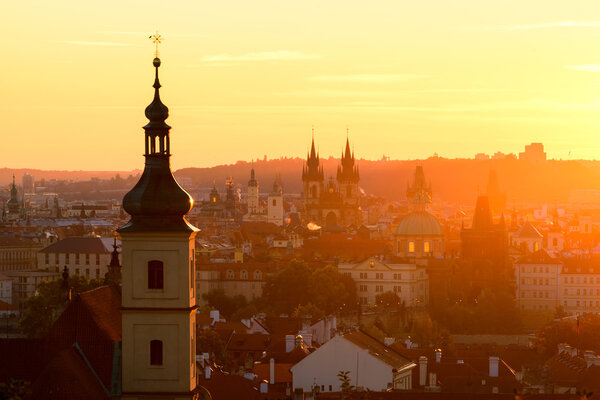 The Gothic church of Our Lady before Tyn during amazing sunrise. City of hundred spires. Beautiful summer morning. Prague, Czech republic
