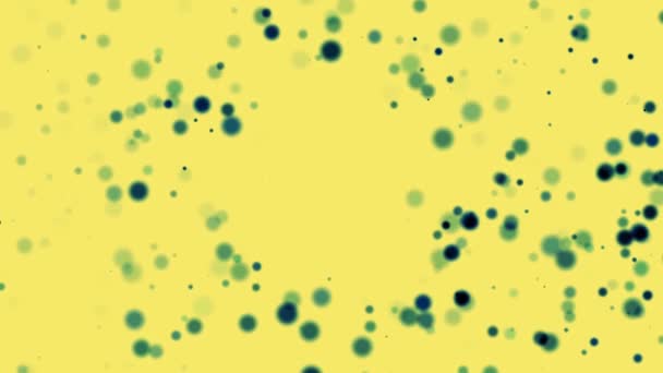 黄色の粒子は黄色の背景でボケます モーショングラフィックス — ストック動画