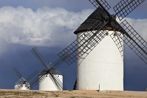 Windmills and dark, cloudy sky, Campo de Criptana, Spain — Stock Photo, Image
