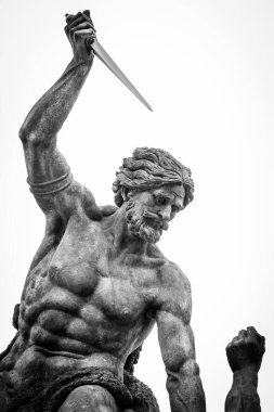 A Violent Statue Of A Man With A Knife, Prague Castle, Czech Republic clipart