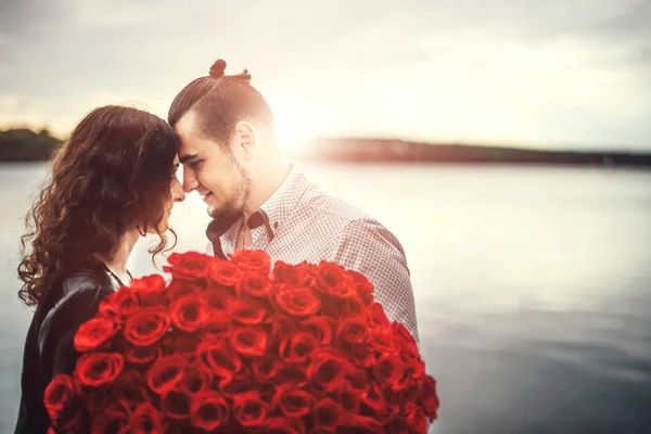 Couple near lake in the park Royalty Free Stock Photos