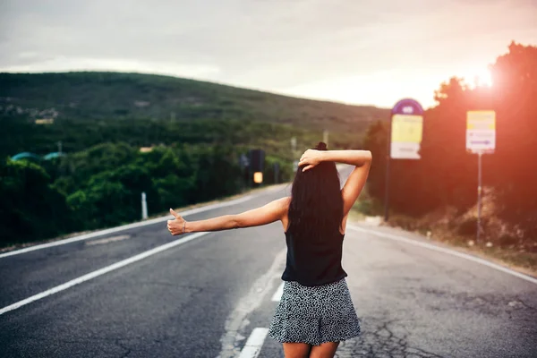 Pretty tourist girl on the road — Stock Photo, Image