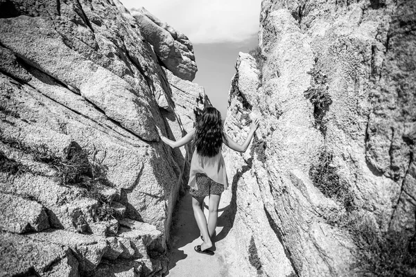 Girl relaxing on the stones — Stock Photo, Image