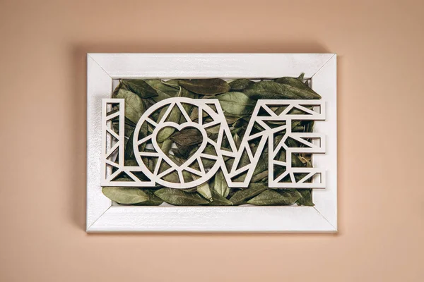 Creative Flat Lay Word Love Frame Soft Color Background — Fotografia de Stock