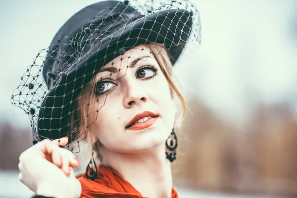 Young pretty sexy lady in black dress outdoor — Stock Photo, Image